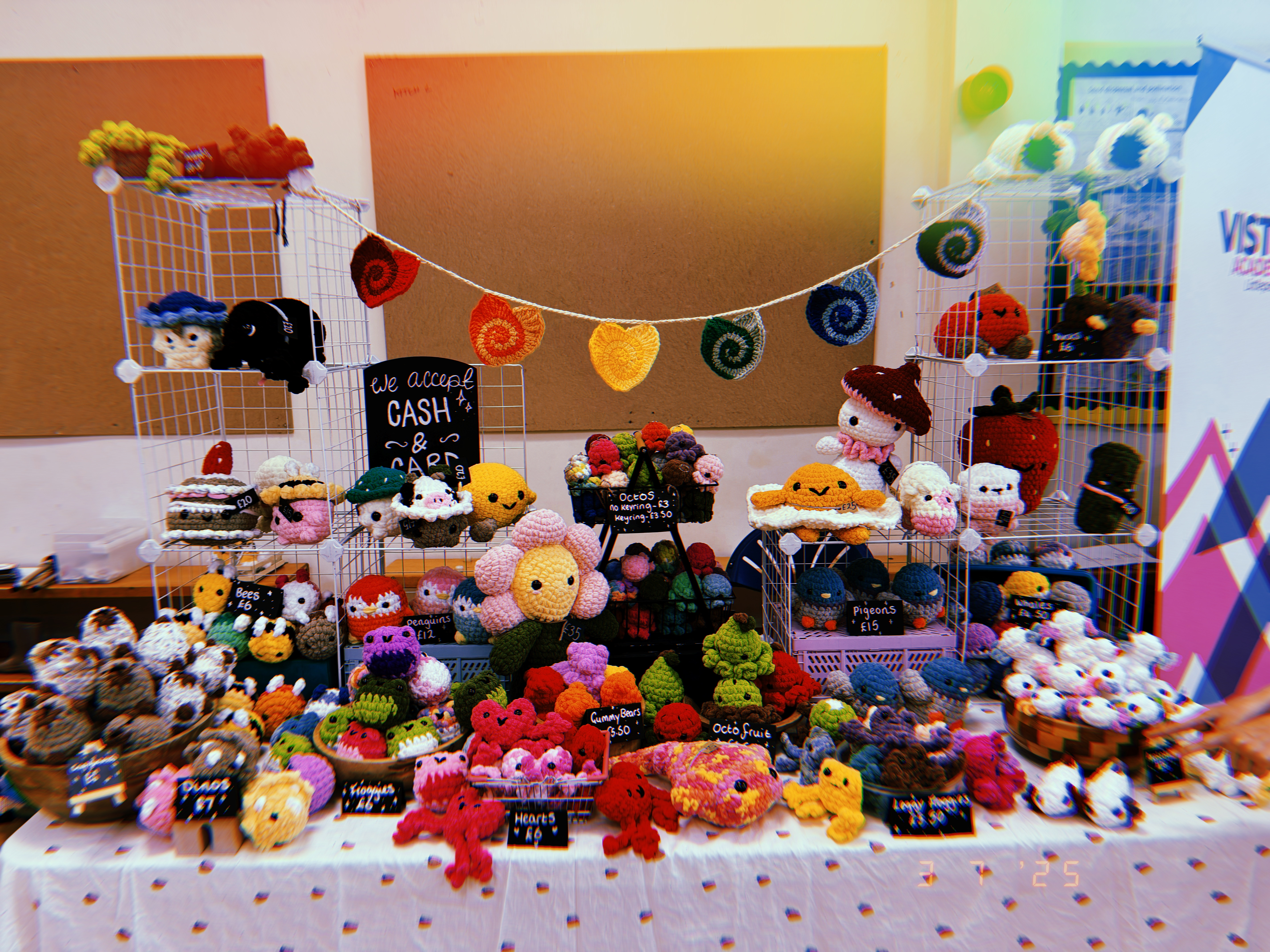 stall full of crocheted pluhies